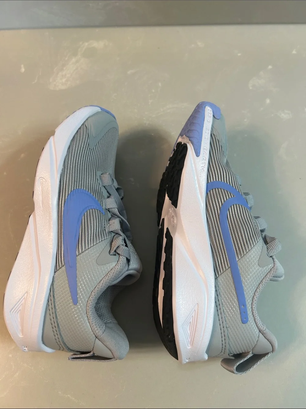 Nike Kids Grey Sneakers with Blue Swoosh